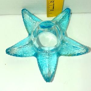 Aqua blue motive candle holder